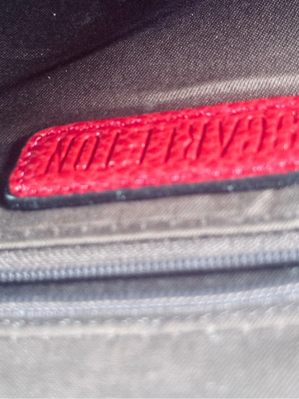 Pebbled Red Women's Leather (?) Backpack with Gold Hardware